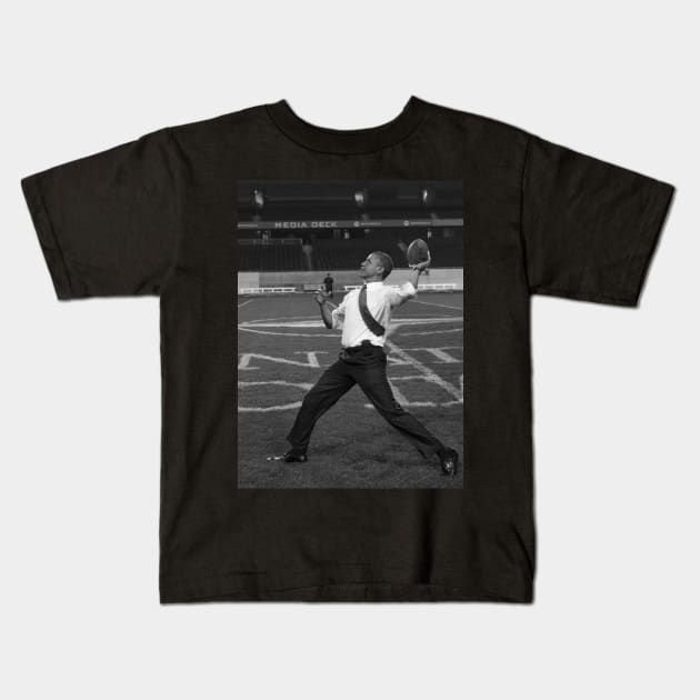 President Barack Obama throws a football Kids T-Shirt by Soriagk